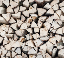 Fototapeta premium Seamless texture or background of firewood stack