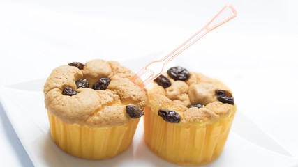 A Cup cake with currant.