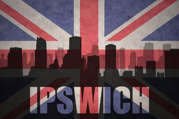 Obraz premium abstract silhouette of the city with text Ipswich at the vintage british flag