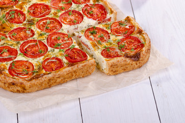 Tart with tomato and fresh herbs