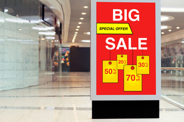 billboard advertising big discount and sale in large store
