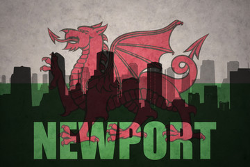 abstract silhouette of the city with text Newport at the vintage wales flag