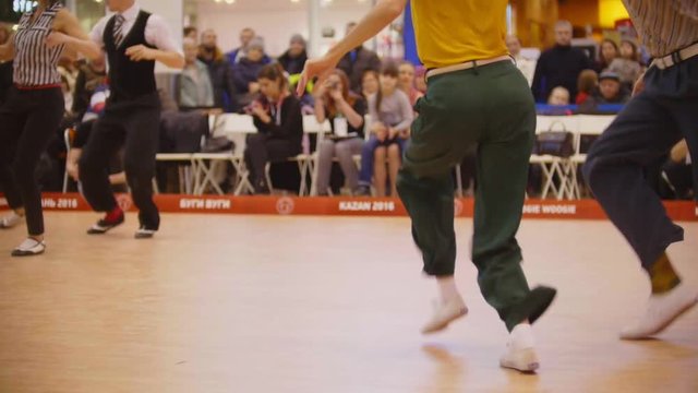 Couples dancing Boogie woogie rock-n-roll. Dance competitions