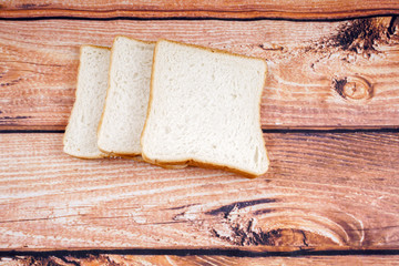 Slice of bread with chocolate hazelnut spread isolated on white