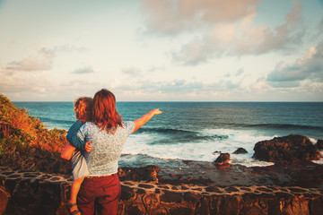 family tousits looking at beautiful nature of Mauritius island