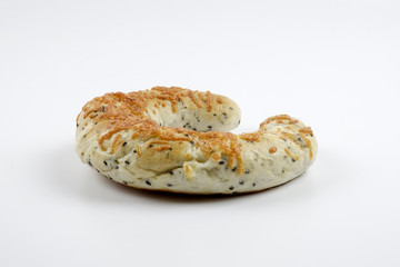 Fresh whole grain bread cut in half on white background