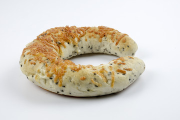 Fresh whole grain bread cut in half on white background