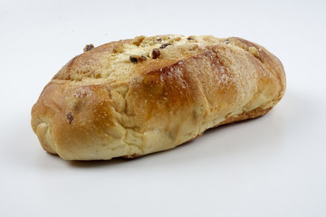 sweet bread with raisin isolated on whie