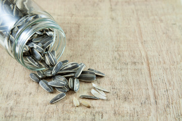 Sunflower seeds and bottle.