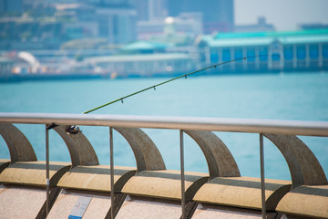 Fishing pole at pier in Hong Kong