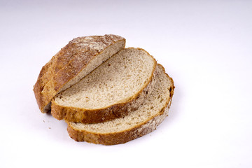 Whole grain bread isolated on white.