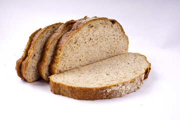 Whole grain bread isolated on white.