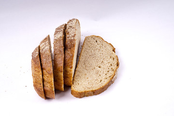 Whole grain bread isolated on white.