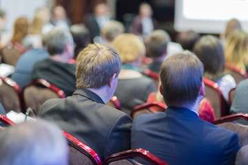 People Listening At the Conference. Back View