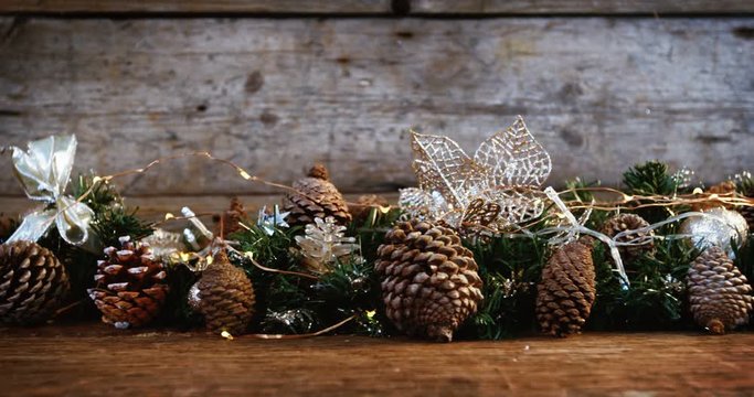 Christmas decorations on wooden plank
