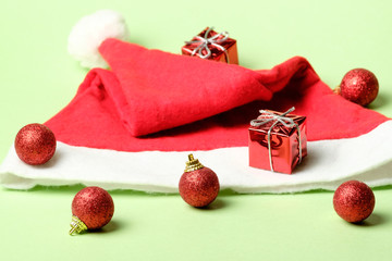 Christmas decoration set balls, gifts and Santa hat