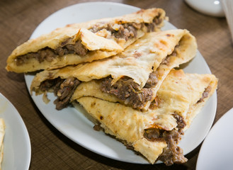 Traditional Georgian meat pie - khachapuri. National cuisine of