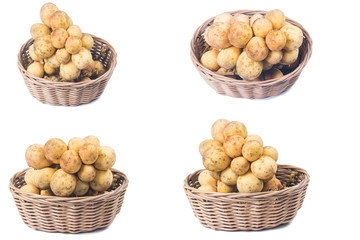 Southern Langsat fruits (Lansium domesticum) in basket isolate on white
