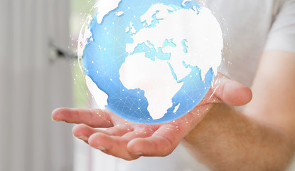 Businessman holding digital tactile world ‘3D rendering’