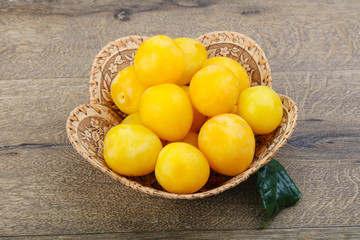 Yellow plums in the bowl