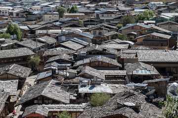 Roofs sea of Shangri-La Old Town, View as seen from Guishan Temple in Yunnan, China.