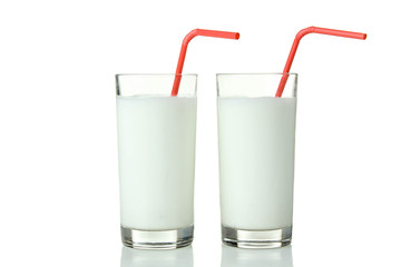 Two milk cocktail in a glass isolated on a white background.