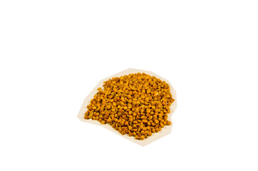 Pile of buckwheat seeds isolated on white background