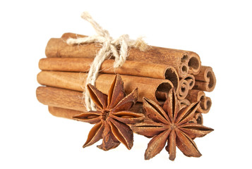 Anise and cinnamon sticks isolated on white background
