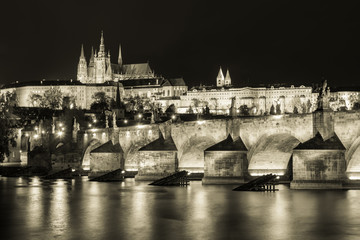 Prague Castle and Charles Bridge at night.