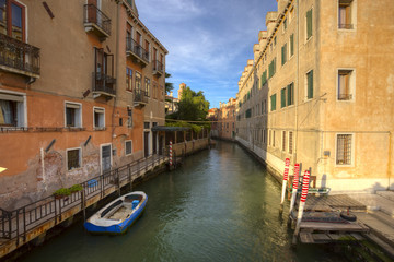 Fototapeta na wymiar Channel street in Venice, Italy