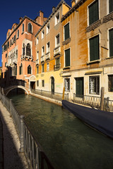Fototapeta na wymiar Channel street in Venice, Italy