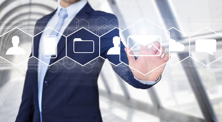 Businessman touching technology interface with business email ic
