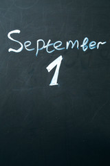 September 1 The phrase written in chalk on the blackboard.
