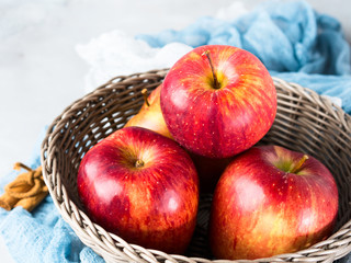 Fresh apples in basket. Healthy eating. Closeup