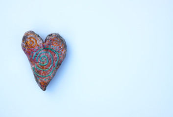 Heart shape on the grass background