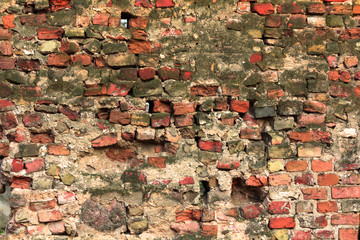 Old red brick wall, under construction