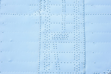 texture of covering the plane with buttons