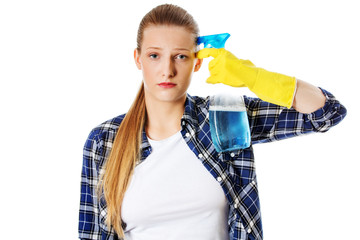 Cleaning concept. Young woman cleaninc.