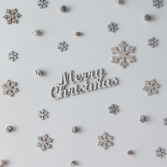 Creative bright pattern made of snowflakes and pine cones. Chris