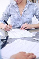 Bookkeepers or financial inspector making report, calculating or checking balance. Audit concept.