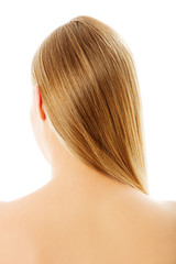 Fototapeta premium Beautiful long blonde hair, isolated on white.