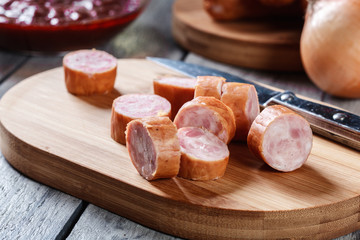 Ingredients ready for preparing German currywurst with curry sauce