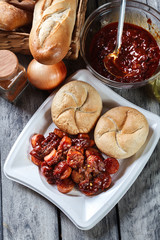 Delicious German currywurst - pieces of sausage with curry sauce