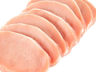 raw pork pieces isolated on white background