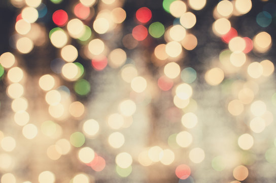 Christmas card. Bright blurred defocused Xmas lights background with copyspace, your text space.