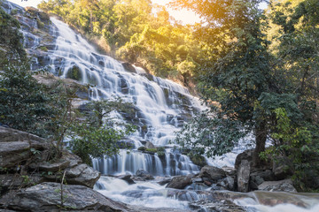 Fototapeta na wymiar Waterfall in rainforest at Thailand