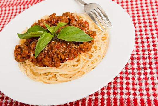 Pasta with tomato sauce and basil, food. Italian food