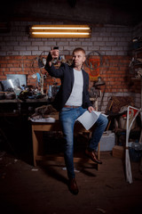 Obraz na płótnie Canvas man in suit on an industrial premises, businessman