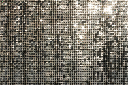 Silver background mosaic with light spots and stars