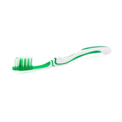 Green toothbrush isolated over white background
